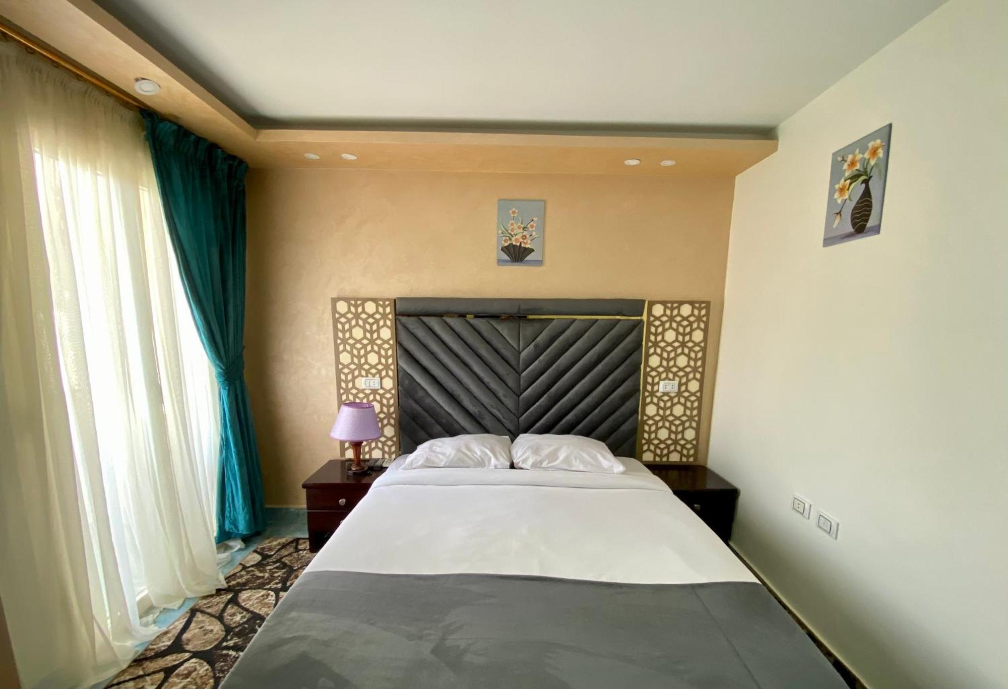 Golden Pyramids Inn Kafret el-Gabal エクステリア 写真