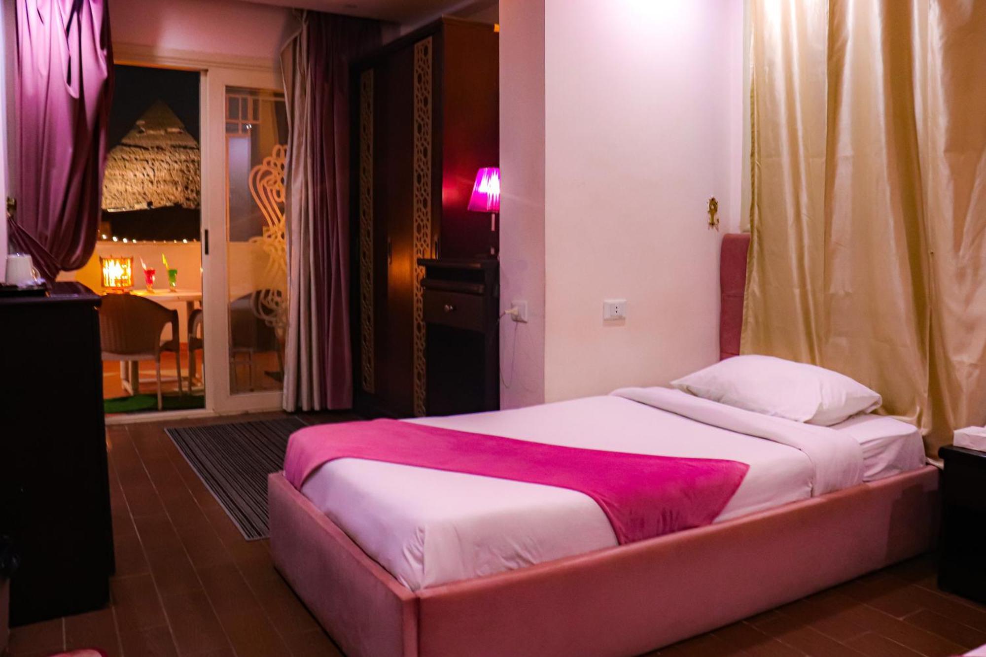 Golden Pyramids Inn Kafret el-Gabal エクステリア 写真